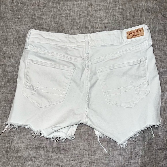 White Denzin from Levis denim low rise cutoff shorts. Women size 9/29 waist. - Picture 2 of 4